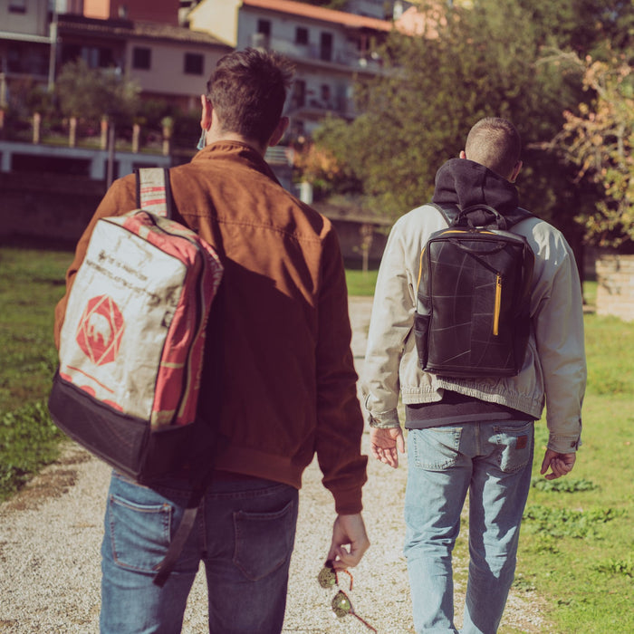 Hackney sustainable backpack with Brixton recycled backpack on left