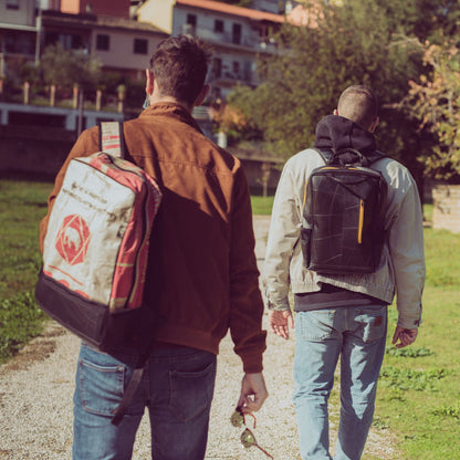 Hackney sustainable backpack with Brixton recycled backpack on left