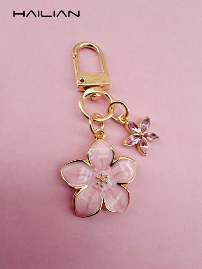 HAILIAN This Lightweight And Elegant Sakura-Shaped Keychain Is Made Of Alloy Material, Designed Specifically For Women, And Features A 5-Petal Small Flower As A Bag Charm. A Travel Accessory, It Can B