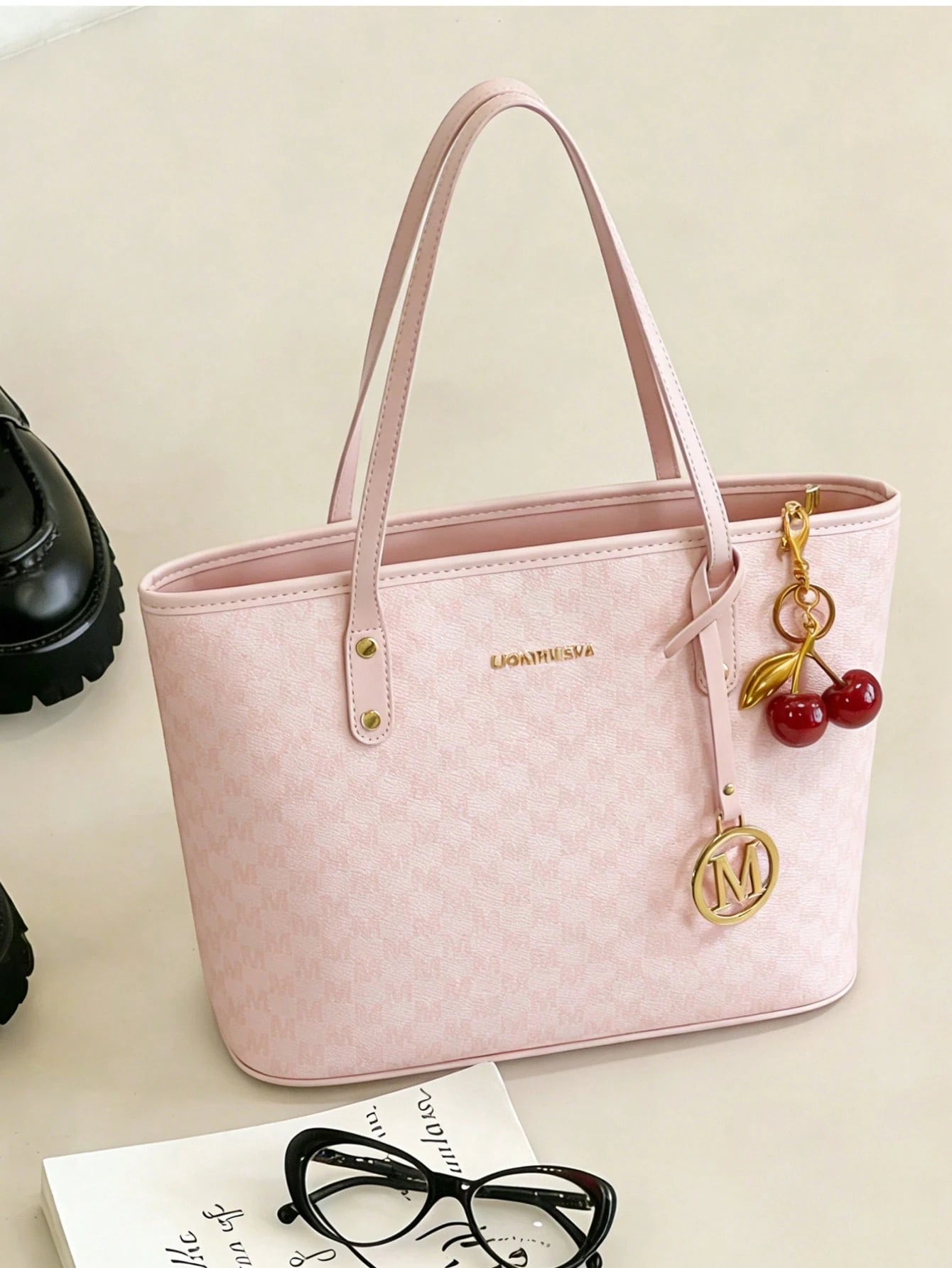 This Fashionable New Shoulder Bag Is Made Of Waterproof PU Material, Decorated With Letter Patterns And Cherry Pendants. It Is A Spacious Handbag And Business Commuter Bag, Suitable For Shopping, Comm